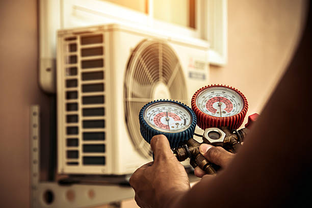 Professional Heat Pump Repair technician working in Austinburg, OH